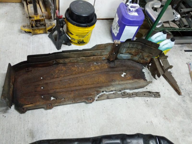 Skid plate pieced back together for measurements. 